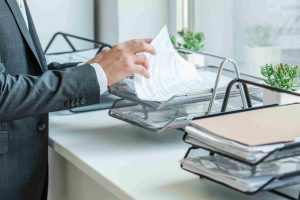 professional-reviewing-documents-in-the-office-2026-09-21-04-05-03-utc